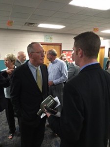 Sen. Lamar Alexander has a conversation with James Thompson who identified himself as a member of a local tea party