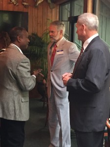 Michael Covington talking with County Commissioner Dave Wright and Property Assessor candidate John Whitehead 