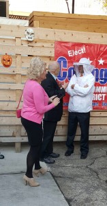 Carla & Ted Hatfield discussing bee stings with Bee Keeper State Rep. Bill Dunn