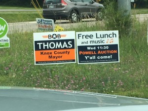 The free lunch sign is compliant, The sign on the left is in violation of Knox Co Zoning Regulation 3.90.02 (F) 