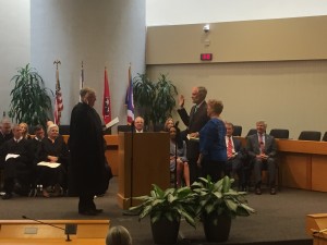 Commission Chairman Dave Wright taking the oath of office by Judge Dale Workman with his wife Pat. 