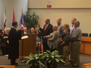 Knox County Property Assessor surrounded by his family is sworn in by Chancellor John F. Weaver