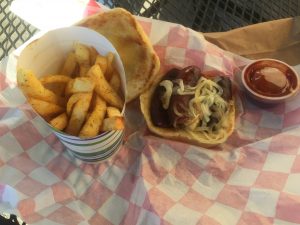 I tried the sausage sandwich and fries from the Taste O Texas truck. It was good.