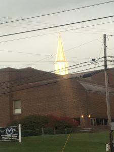 It had rained during the fundraiser and as I came out the setting Sun was shining on the steeple of Central Baptist of Fountain City