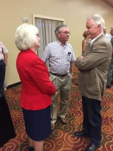 State Senator Mae Beavers talking with Bruce Williams and Tim Graham. Graham owns the Expo Center and donated the facility for tonight's event.