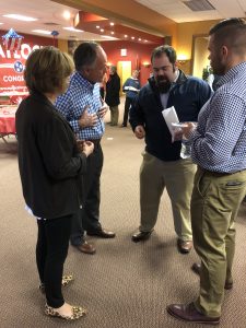 Mrs. and Rep. Matlock talking with a voter as campaign consultant Shawn Hatmaker listens 