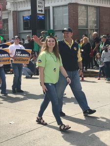 Tramel and his daughter lead their volunteers in the parade