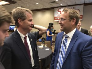 Biggs being congratulated by Knox County Mayor Tim Burchett