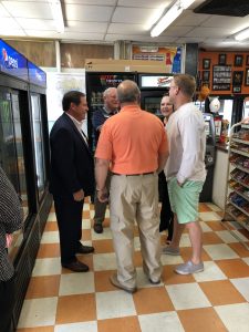 Tom Spangler, Republican candidate for Knox County Sheriff talks with customers including Chief Eddie Biggs and Justin Biggs