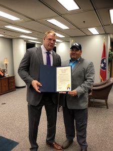 Knox County Mayor Glenn Jacobs presenting the proclamation for Pulmonary Fibrosis Month to Brian Hornback 