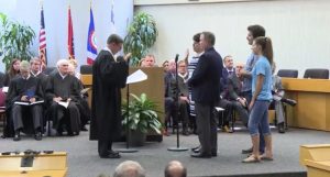 Kristi Kristy being sworn in on August 31