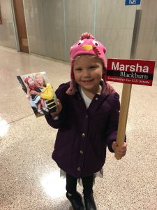 A young Marsha supporter with a picture from when she met Marsha a few years ago 