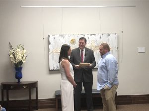 Knox County Commissioner at Large Larsen Jay performing the first marriage ceremony in the Inspiration Room after being dedicated to Former Commissioner Horner