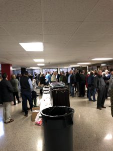 People gathering around the food