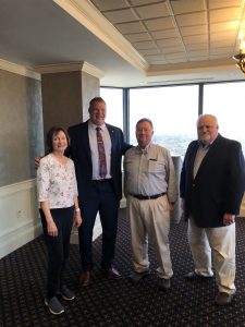 Mrs. Smith, Mayor Jacobs, Mr. Ed Smith and Walt Wojnar of LodgingSmith 