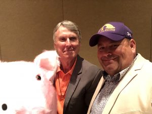 David Williams, a candidate for City Council at Large Seat C and his mascot Salami, the piggy