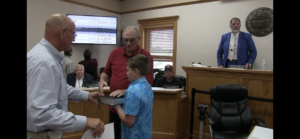 Ferguson being sworn in by Roane County Mayor Ron Woody
