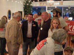 Pickel talking with people that attended including Sheriff Guider